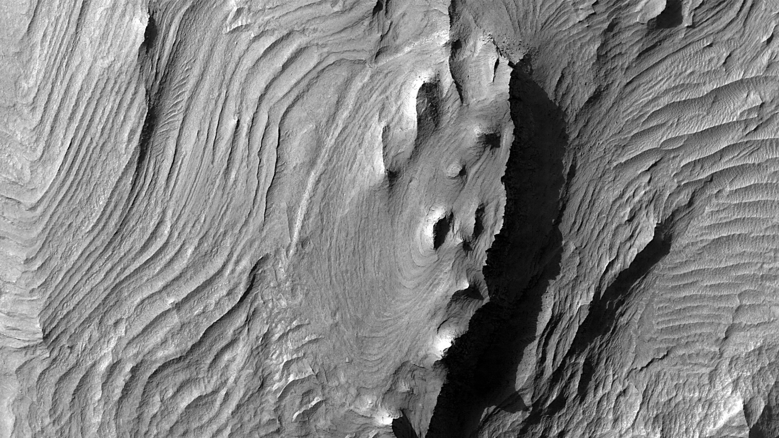 Featured image for Longest Solar System Canyon Unveils New Secrets