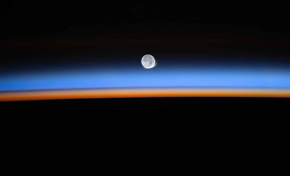 Featured image for Astronaut's Space Photo Reveals Rare Lunar Halo and a New Moon View