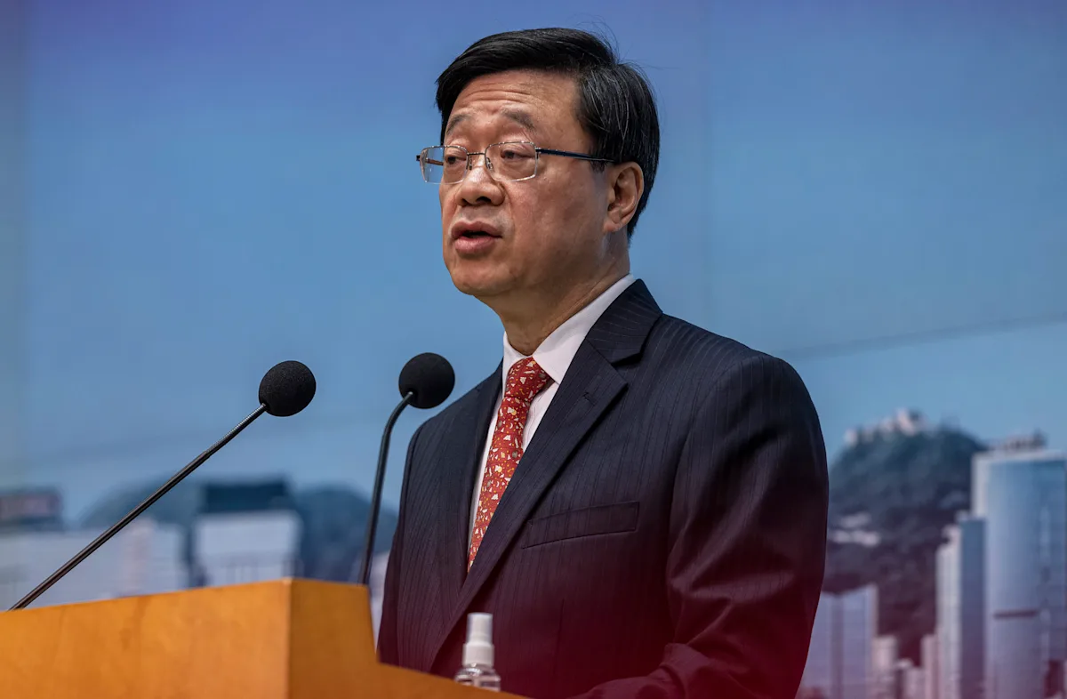 Hong Kong leader warns of national security threats after US citizen sentenced by China.
