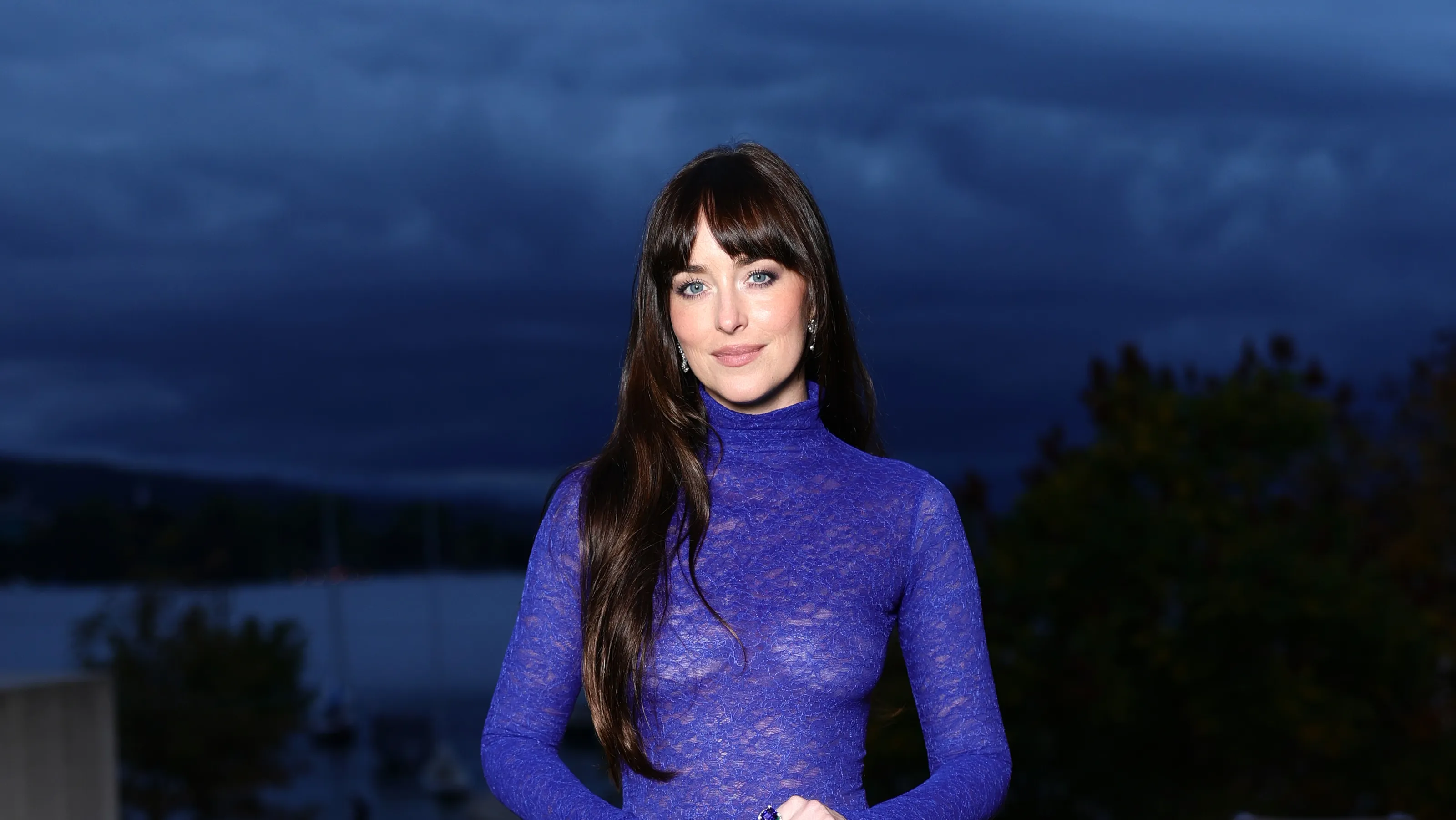 Featured image for Dakota Johnson Turns Heads in Sheer Gucci Gown at Zurich Film Festival