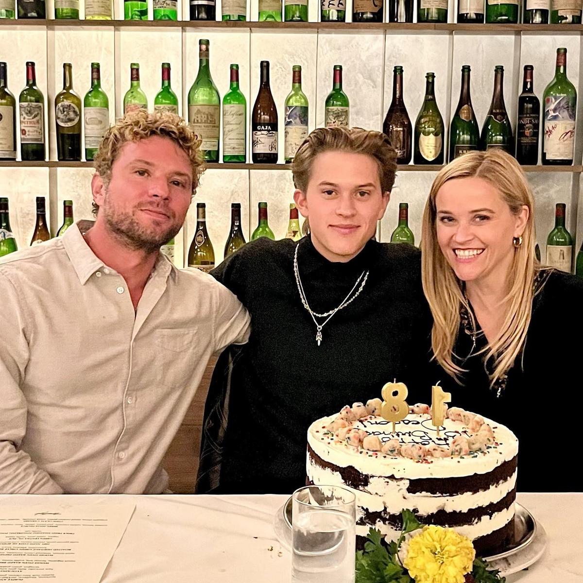 Featured image for Reese Witherspoon and Ryan Phillippe reunite to support son's album release.