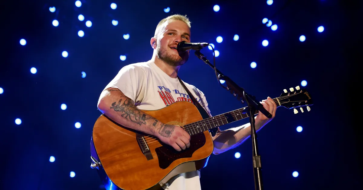 Featured image for Zach Bryan's New Album Sparks Rumors About Ex and New Wife