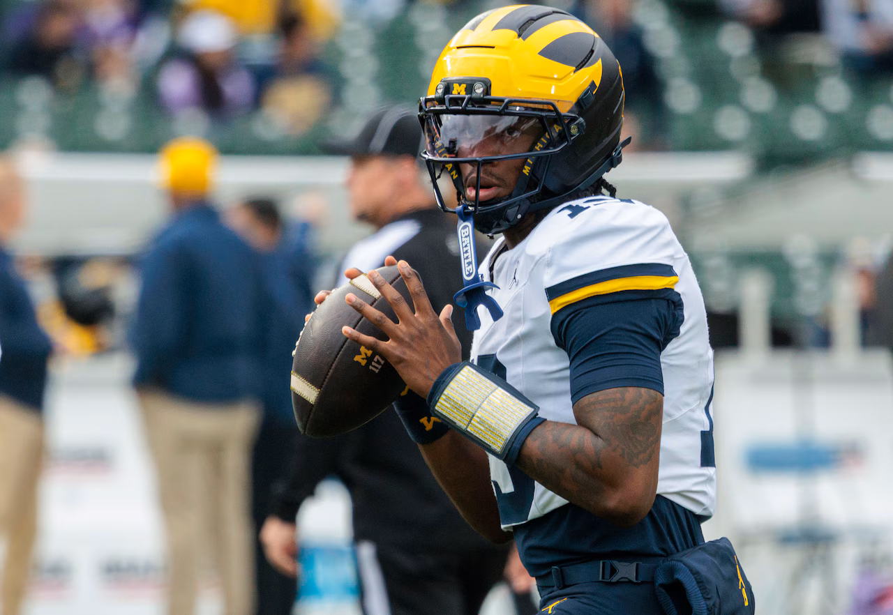 Featured image for Michigan hires Kyle Whittingham as new head coach amid QB Bryce Underwood’s future uncertainty