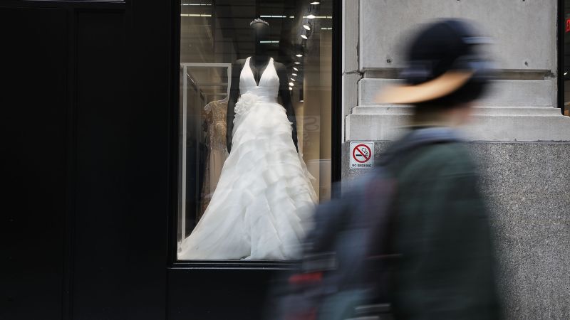 Featured image for David's Bridal faces financial struggles, considers sale and closures.