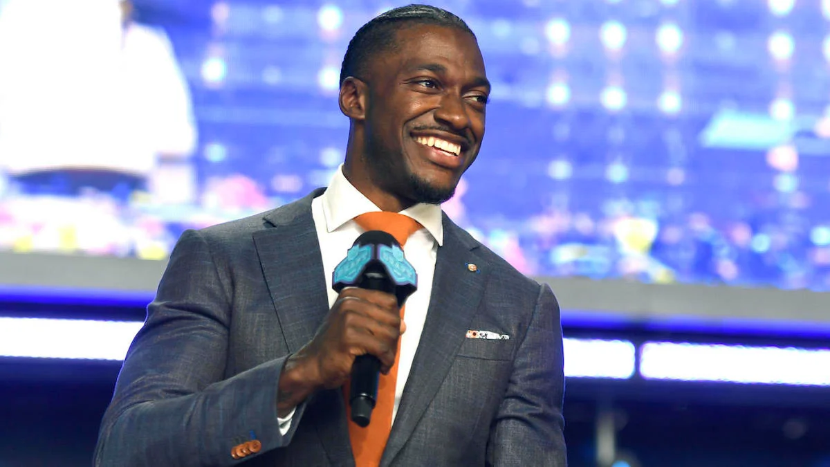 Featured image for Robert Griffin III hints at ownership stake in Commanders bid.