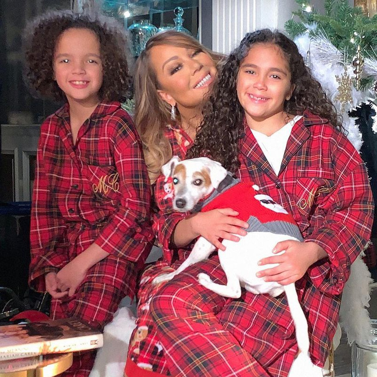 Featured image for Mariah Carey's Twins Outgrow Her in Festive Photos