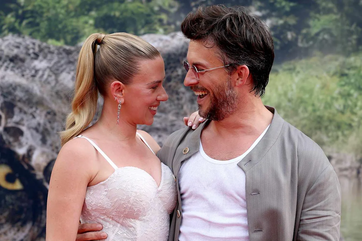 Featured image for Jonathan Bailey and Scarlett Johansson Share Red Carpet Kisses Amid PDA Debate