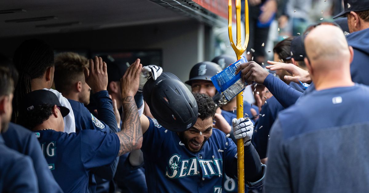 Featured image for Mariners Dominate A's with 11-2 Victory and Space Heater Blast.