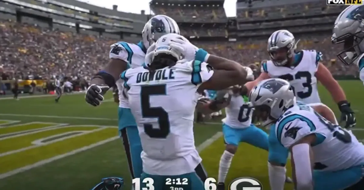 Featured image for Rico Dowdle turns NFL fine for 'two-pump' celebration into a message of hope