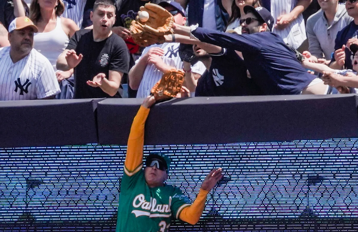 Featured image for Controversial fan interference leads to Yankees' 3-run HR against A's.