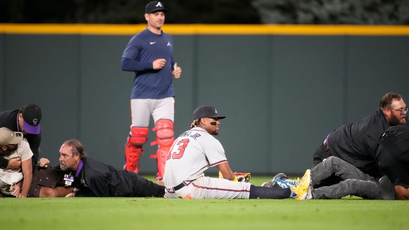 Featured image for Ronald Acuña Jr. Tackled by Fans at Coors Field