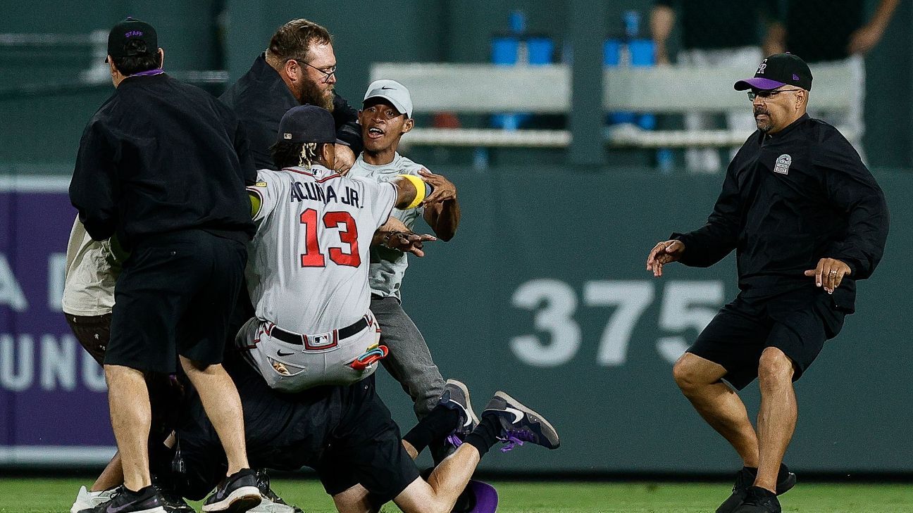 Featured image for "Braves' Ronald Acuña Jr. Confronted and Tackled by Fans at Coors Field"