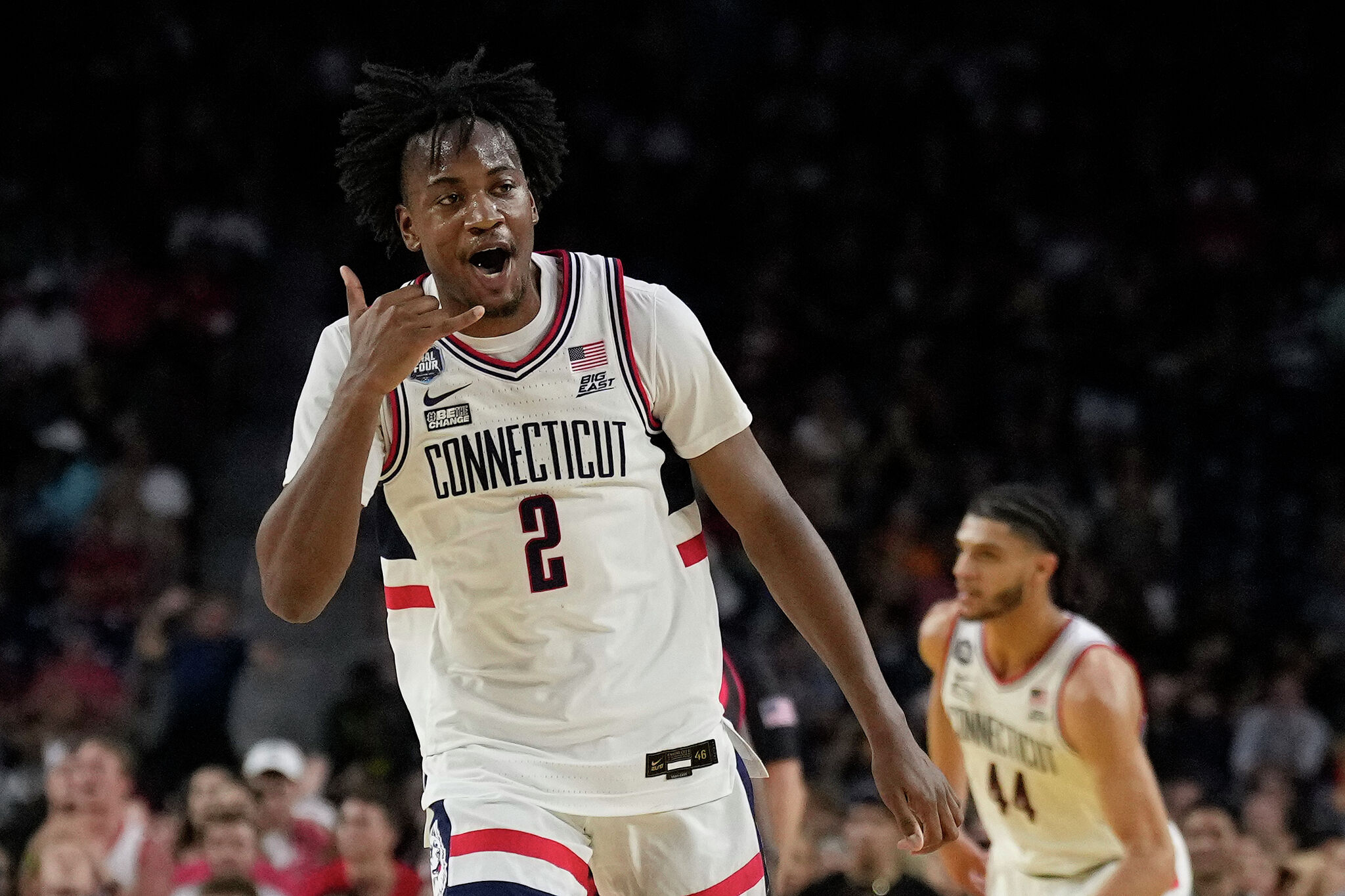 Tristen Newton chooses UConn over NBA for final season.