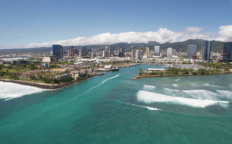 Featured image for Surfer attacked by shark in Honolulu's Kewalo Basin.