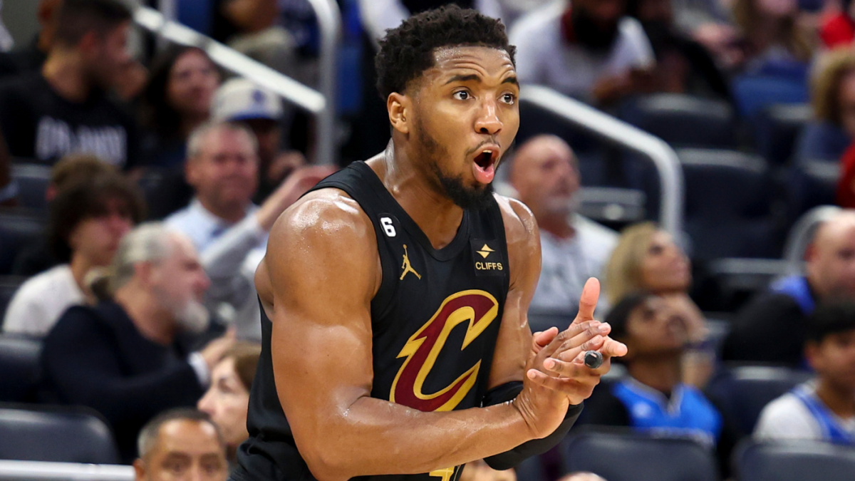 Donovan Mitchell's historic scoring streak helps Cavs secure playoff spot and eliminate Magic.