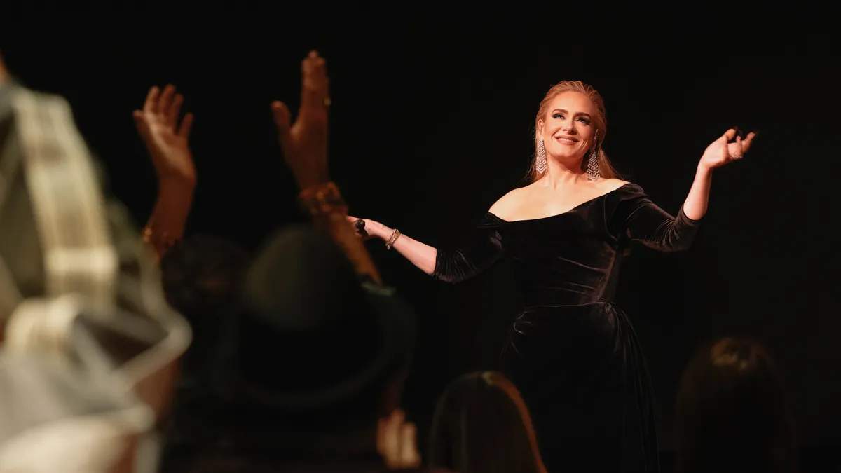 Featured image for Adele Confronts Fans Throwing Objects at Artists