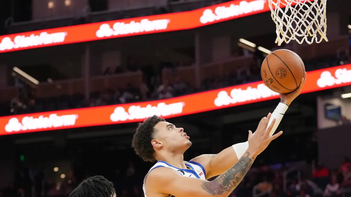 Featured image for Lester Quiñones Stays with Golden State Warriors on Qualifying Offer