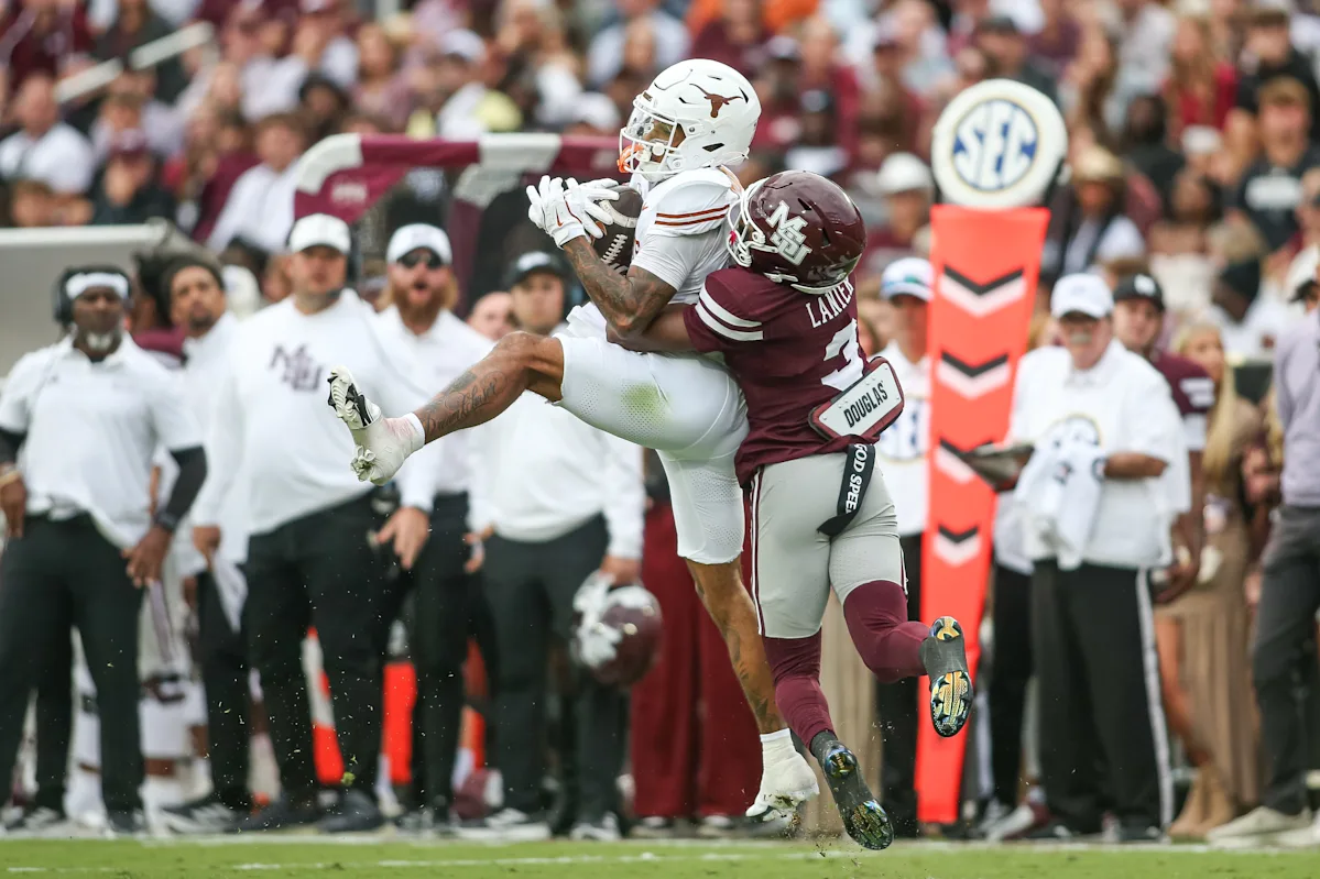 Featured image for Texas Longhorns secure OT victory as Arch Manning exits with injury