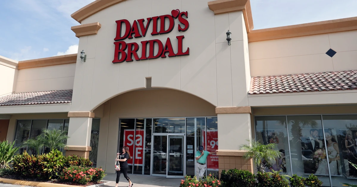Featured image for David's Bridal faces bankruptcy and store closures amidst layoffs and financial struggles.