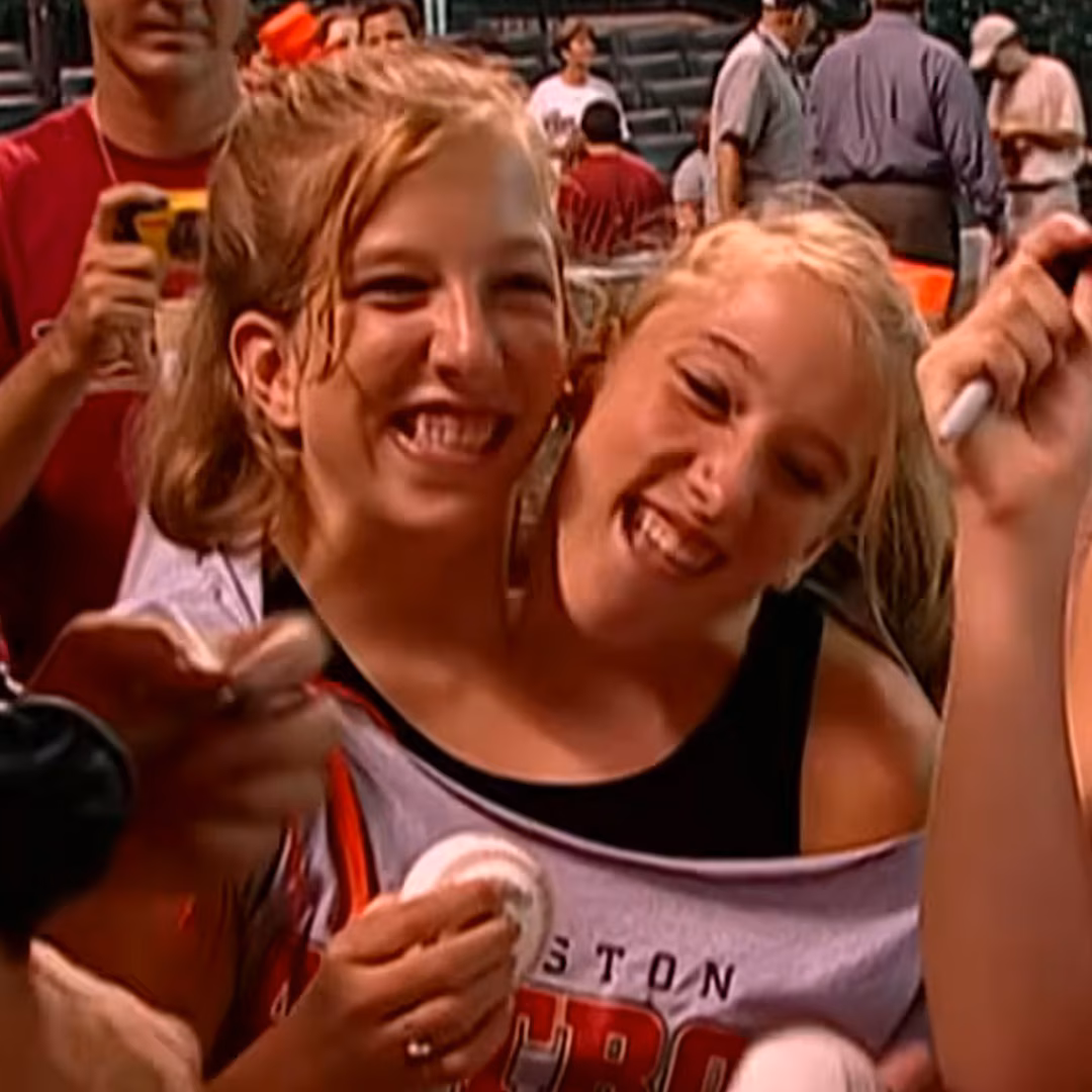 Featured image for Conjoined Twins Abby and Brittany Hensel Make Rare Public Appearances with Newborn