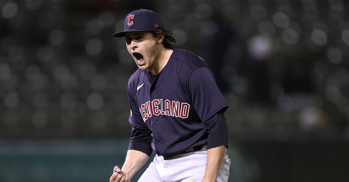 Featured image for Cleveland Guardians secure fourth straight win with extra-innings victory over Oakland A's.