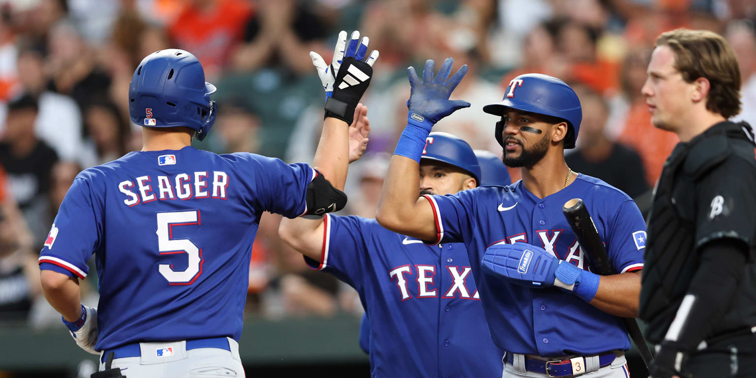 Featured image for Rangers dominate Orioles with 12-2 blowout win.