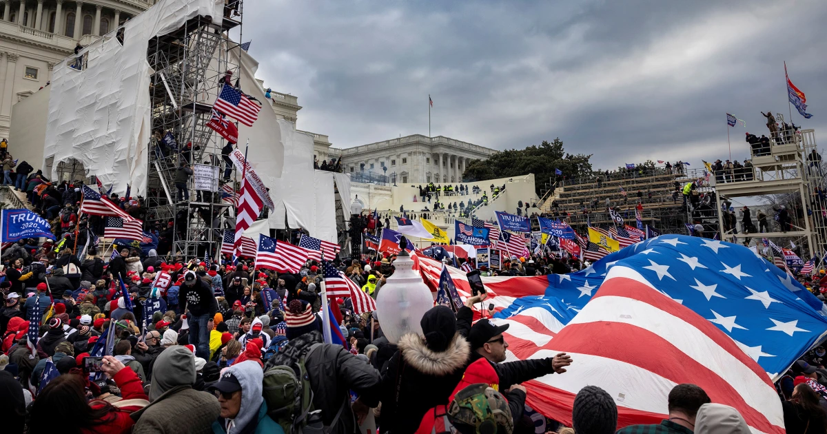 Featured image for DOJ Suspends Prosecutors for Describing Jan. 6 Attack as 'Mob of Rioters'