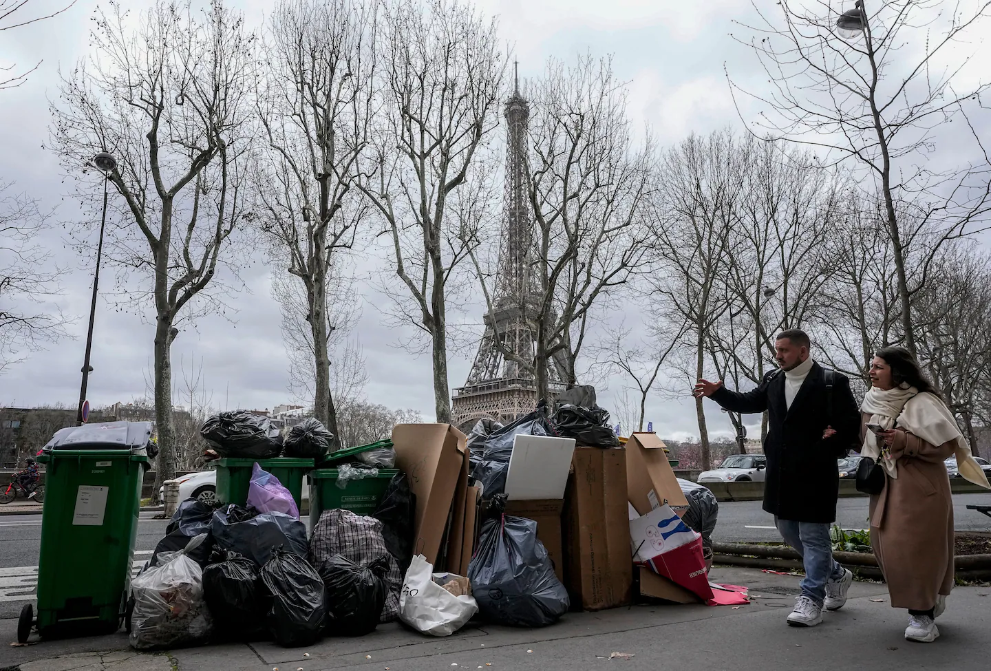 Featured image for Paris overwhelmed by garbage as sanitation workers strike over pension reform.