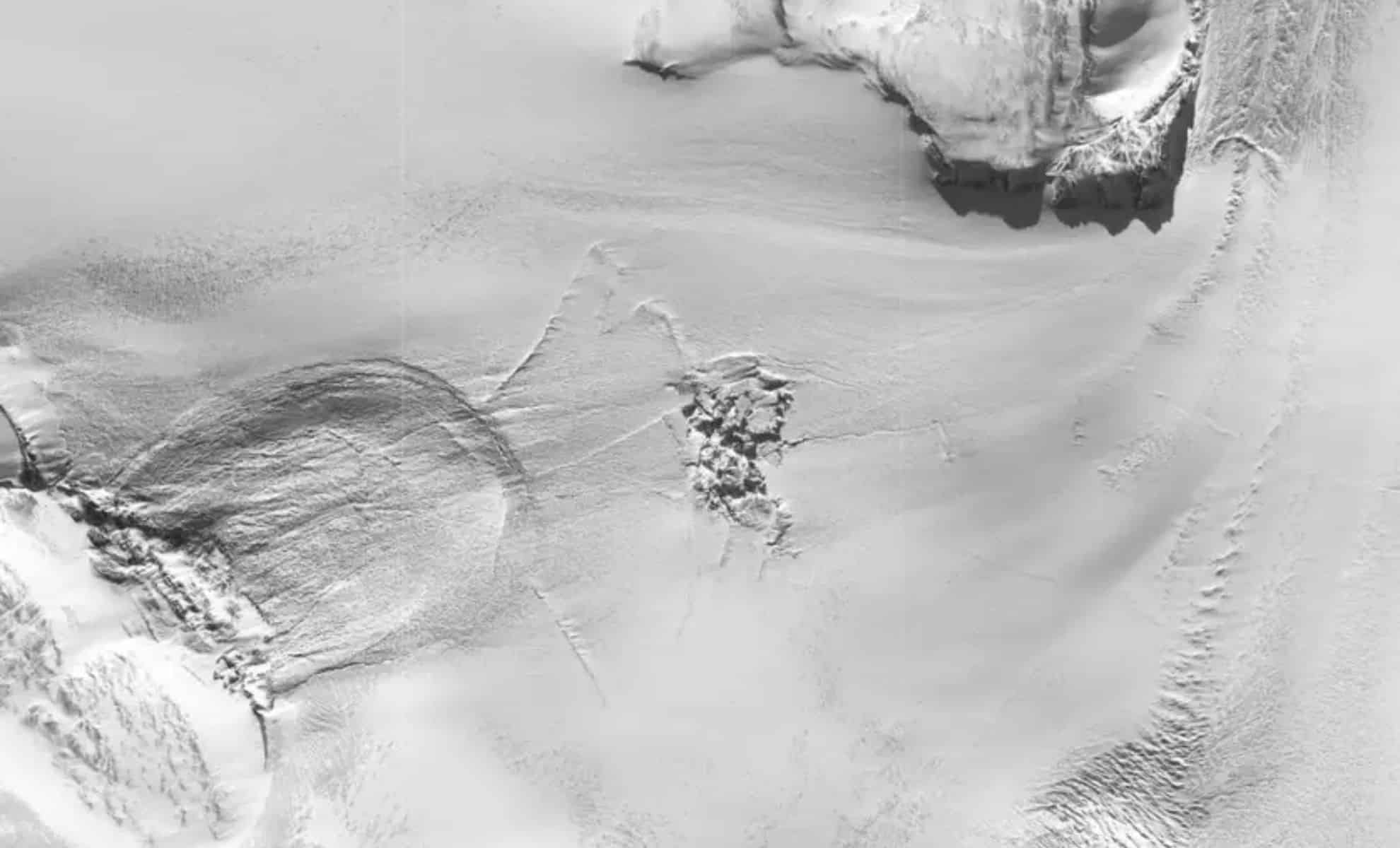 Featured image for Mysterious Subglacial Lake Erupts, Creating Colossal Crater in Greenland