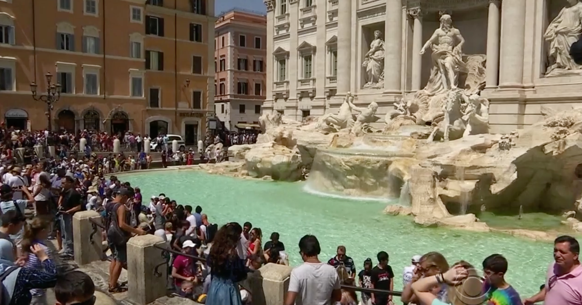Featured image for Tourist's audacious act: Climbing Rome's Trevi Fountain to quench her thirst