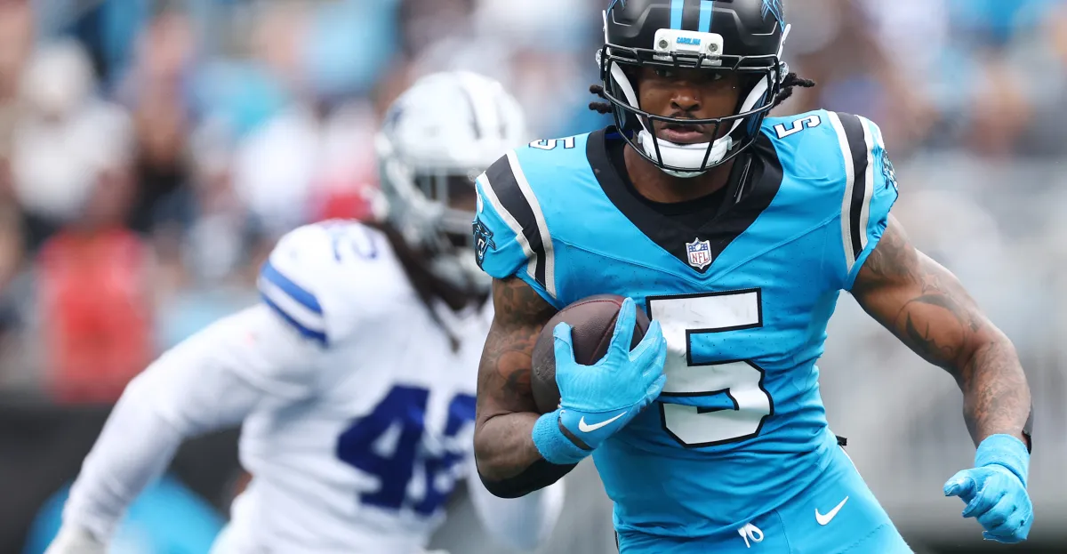 Featured image for Rico Dowdle's Rising Impact and Uncertain Starting Role in the NFL