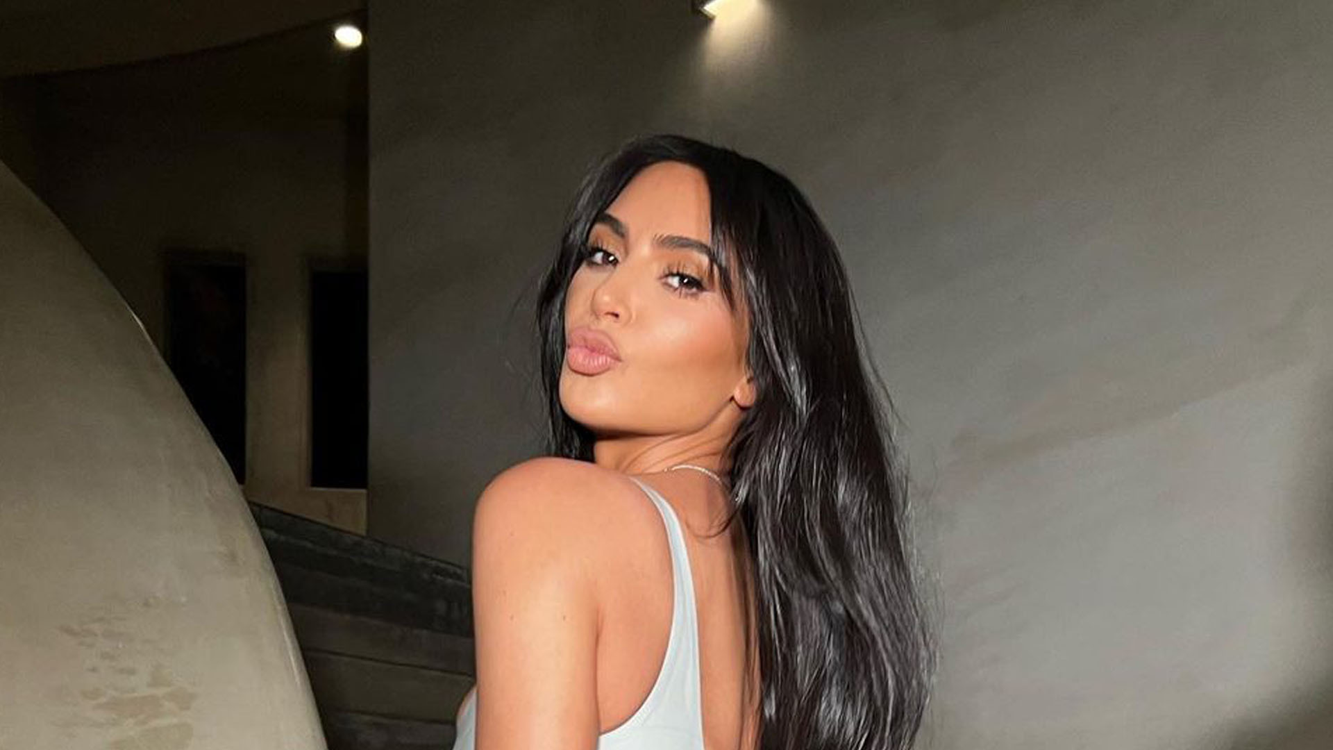 Featured image for Kim Kardashian's wild weekend: mini golf, crocodile jumpsuits, and accidental golf club whacks.